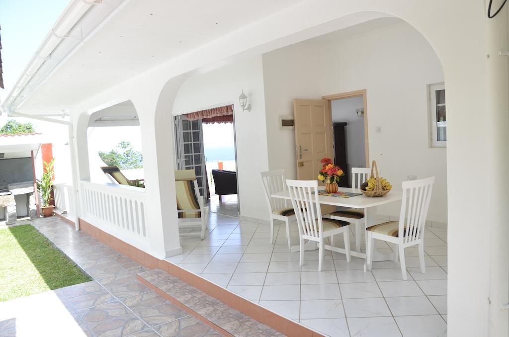Ixora Villa Anse Royale Habitación foto