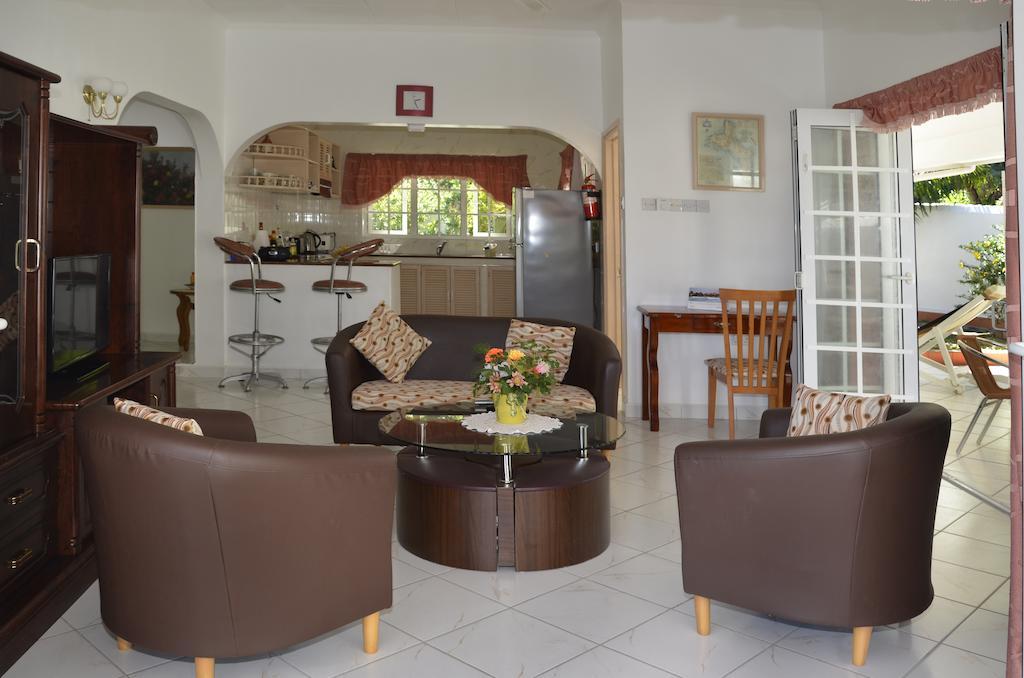 Ixora Villa Anse Royale Habitación foto