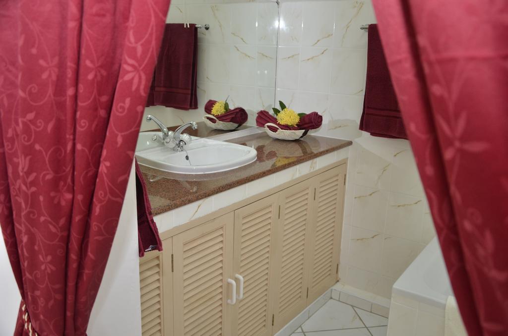 Ixora Villa Anse Royale Habitación foto