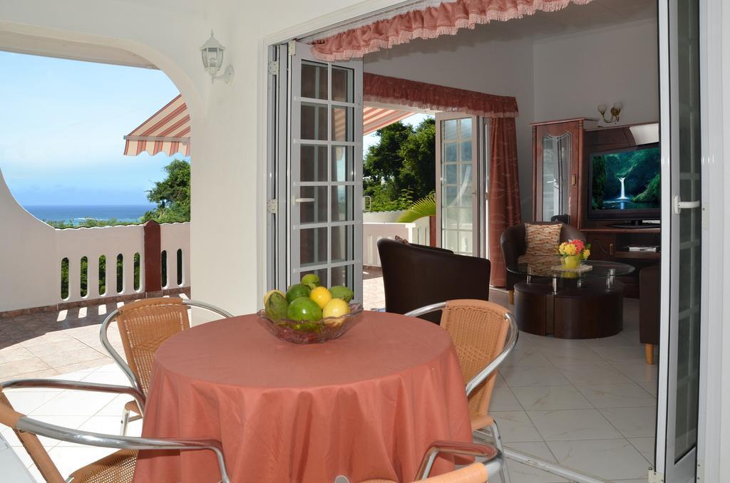 Ixora Villa Anse Royale Habitación foto